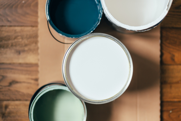 An arial view of open paint cans.